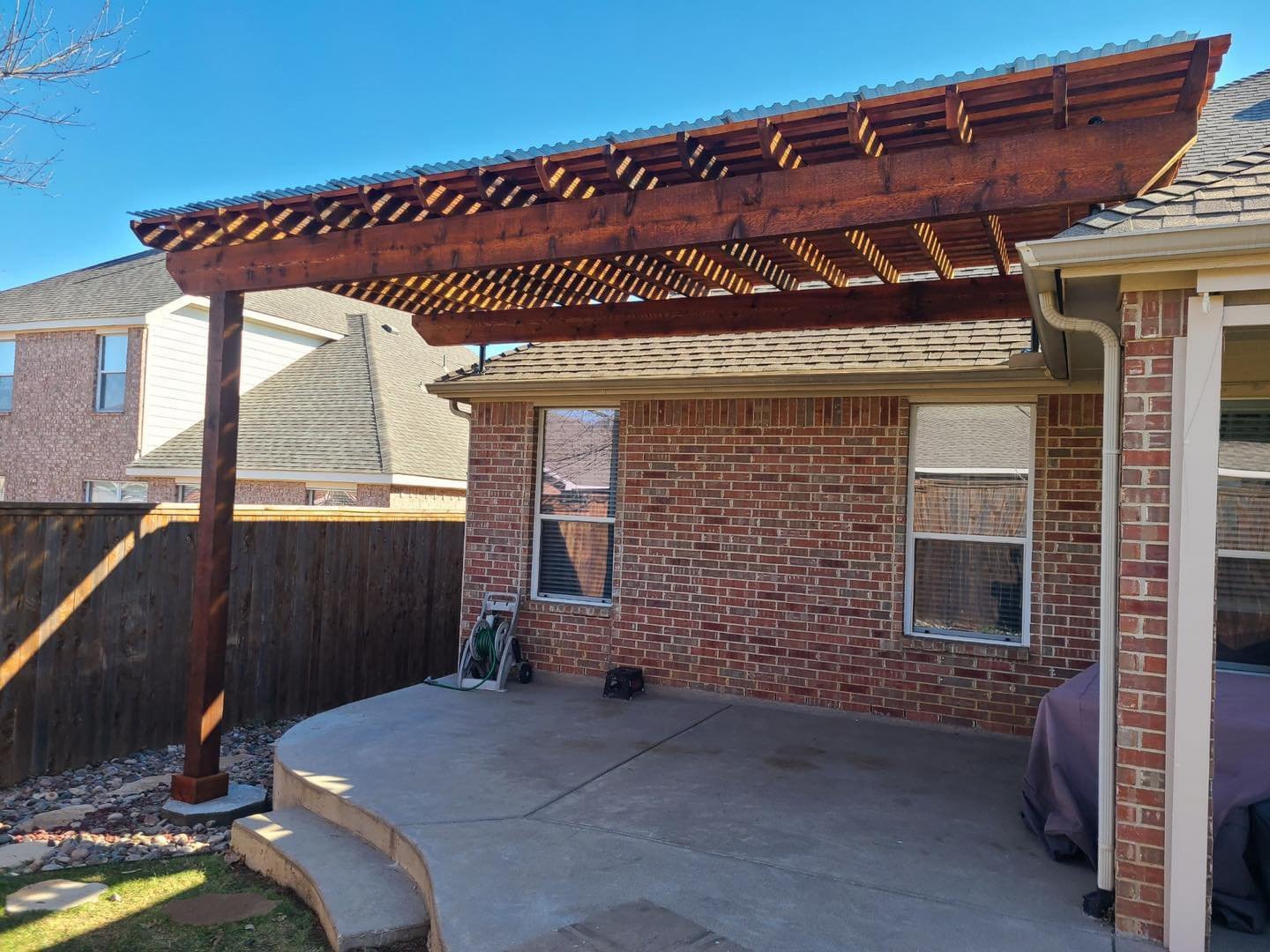 new pergola attached to dallas home